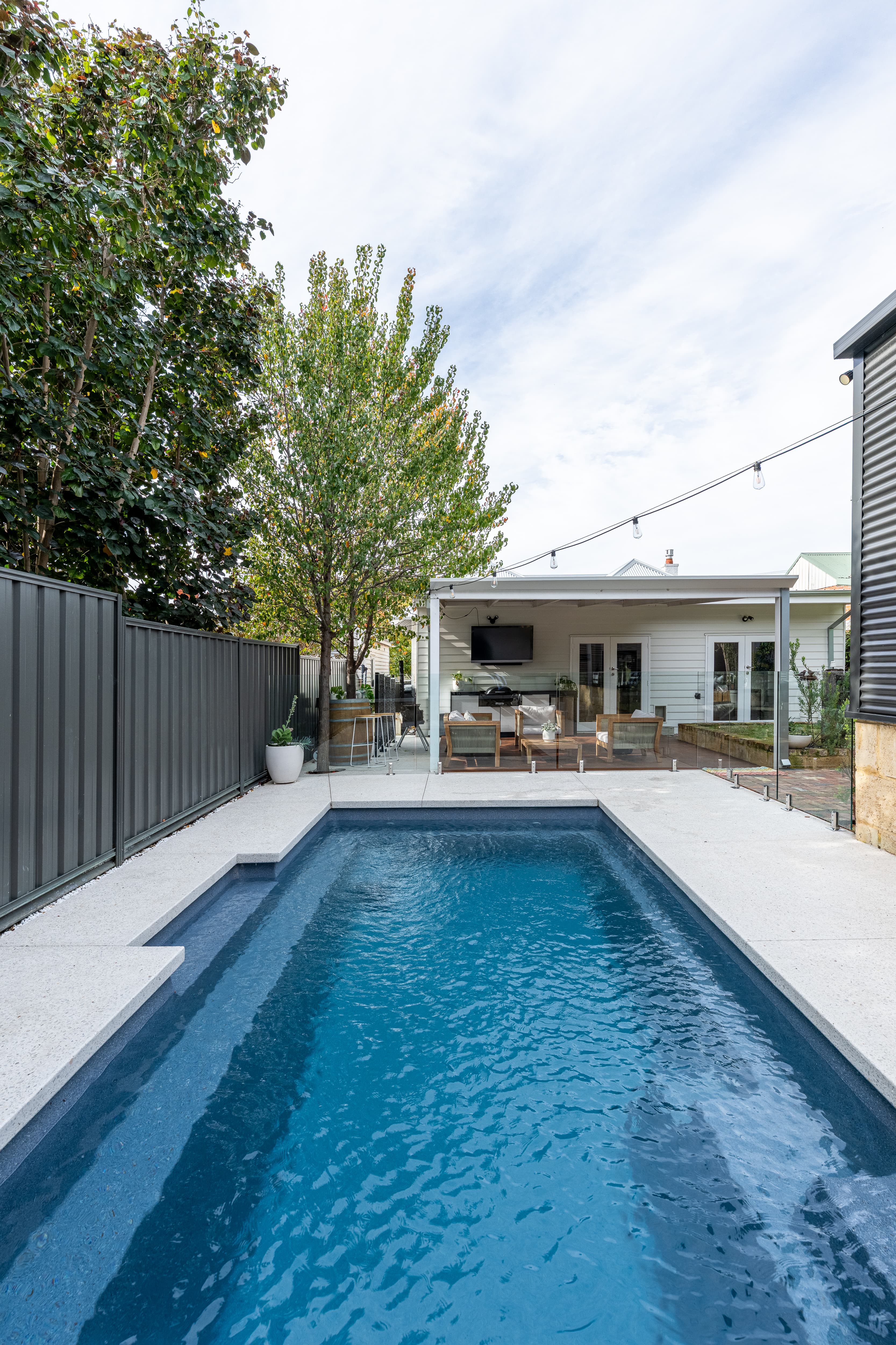 Symphony pool with evening lighting in Bassendean